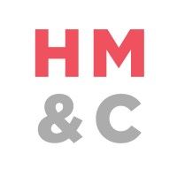 white logo with the letters " H M" in red and the "& C" in gray.