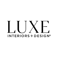 white logo with "LUXE interiors + design" in black lettering