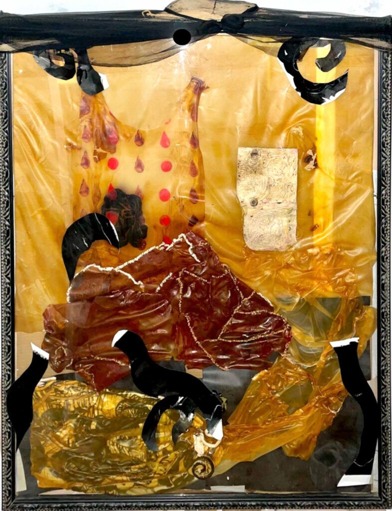 Fabric and objects pressed against glass. There are patterns painted onto the fabrics.