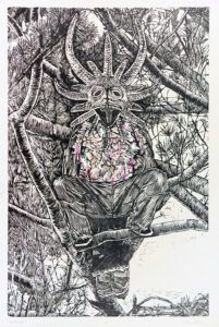 Vejigante sitting in a tree. The chest of the figure is filled with colorful shapes.