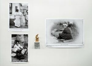 Black and white photos of women wearing dresses surrounding a Venus statue.
